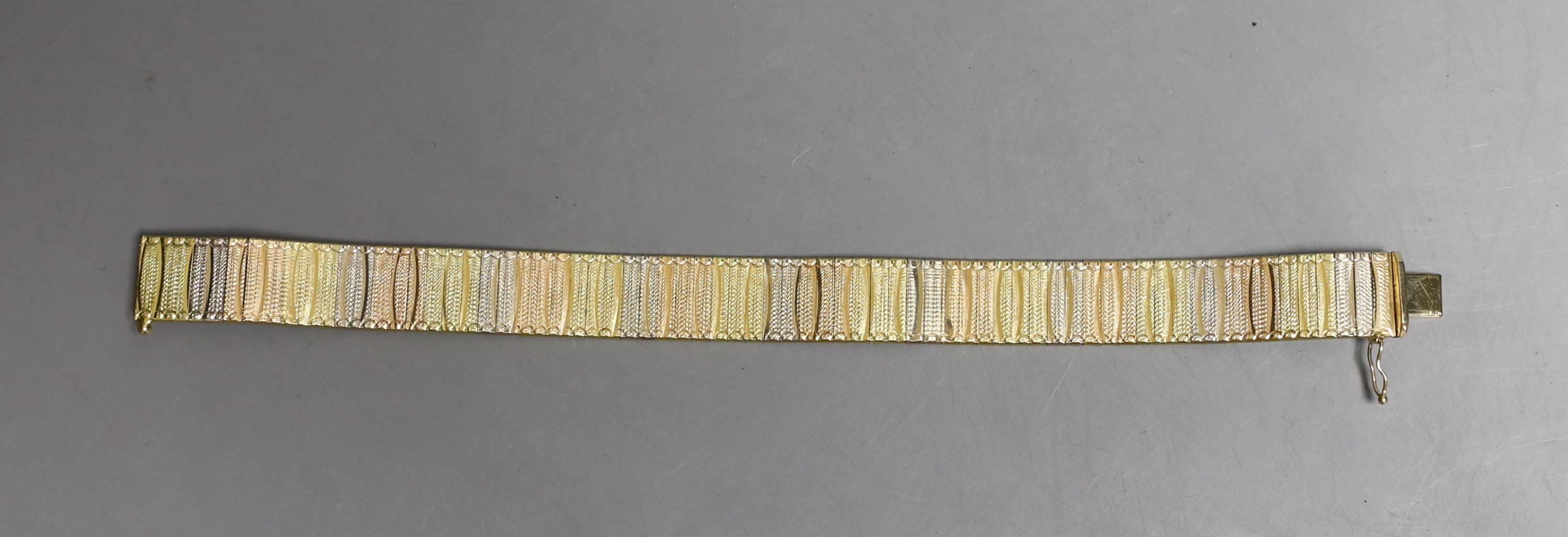 A modern Italian three colour 18ct gold bracelet, 19cm